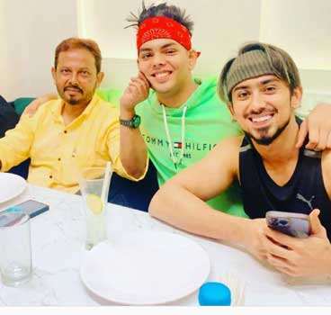 Adnaan Shaikh with his father and brother