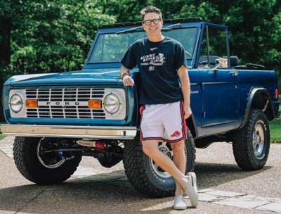 Bobby Bones with his car